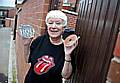 DISC will do nicely . . . May Boydell and her new gate made out of plastic CD covers 
