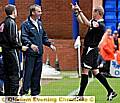 OFF YOU GO: Athletic manager John Sheridan is sent to the stands by referee Andy Hall. 
