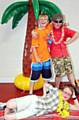 A TROPICAL paradise for (back, from left) Thomas Gray, Jack Grennan and Ben Hunt 