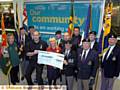 HELPING the heroes . . . with the cheque (from the left) are Phil Caloe of the Royal British Legion, Tesco Community Champion Caroline Dean, PC Ian McDonald and Dave Parker, secretary of the Royal Artillery Association Oldham and District. 