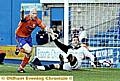 SAME AGAIN, PLEASE: Lee Hughes (left) fires Athletic ahead at Millwall last season. 