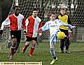 Kain McQuaid, of Failsworth Dynamos under-14s, tries to the hook the ball back into the Ashton United penalty area.
