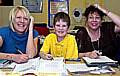Jaime Van Hunskerken (11) studies for his maths GCSE at the Oldham College with Tammie Edwards (left) and Tracie Yarker 