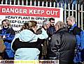 Members of Birks Quarry Action Group meet UU officials at the quarry entrance. 
