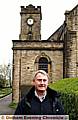 Mike Dalton is seeking answers to why the clock at St Anne’s Church runs fast 