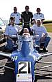 ON your marks . . . Factor 50 fund-raisers Gillian Nuttall and Andy Worthington with some of the drivers and marshals from Formula Ford NW 
