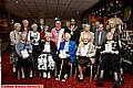 THE Women’s Land Army and Timber Corp Badge recipients with (centre) Mayor of Oldham, Councillor Shoab Akhtar and Mayoress Shafeena Kausar 