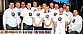 Sporting their new T-shirts are (back row, from left to right) Mike Coulter, Nigel Hill, Peter Holt, Tom Aspin – club chairman, Gordon Beverley, Phil Wiggett - president, Ian Moore, Paul Annersley, Dave Cooper, (fron row, from left to right) Dave MacDougall, NSPCC event organisers Amanda Flynn and Natalie Coverley, Kevin Ridings and Gary Brookfield. 