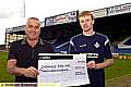 CHRIS TAYLOR is pictured (right) receiving his cheque from Eddy Benedek (Leesfield). 