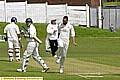 Crompton bowler Aquib Zulfiquar celebrates as Royton’s Dave Clarke walks. 