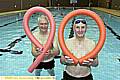 Swimmer Stanley Stewart (right) in Saddleworth Pool with pal John Gallagher 