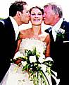 HAPPIER time . . . Nadine Ferguson gets a kiss from Darren and Sir Alex Ferguson at her 2003 wedding. (Picture by John and Kate Photography) 
