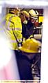 TRAPPED . . . Rescuers attempt to fee a man’s arm from machinery at Print Right in Oldham
