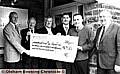 Bryan Pinder (far right), of Veolia Environmental Services, hands over the sponsorship cheque to (from left to right) Philip Hibbert, vice-president of Oldham Metro Rotary Club; Peter Mallison, past president of Saddleworth Rotary Club; Gordon Russell, of Oldham Metro Rotary Club; Martin Curtois, marketing director of Veolia, and Simon O’Connor, Veolia regional manager 
