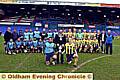 ON PARADE: Coppice United captain Kameel Ahmed and Chaddy End FC skipper Lee Deakin flank Mayor of Oldham, councillor Shoab Akhtar before the Challenge Cup final at Boundary Park. 