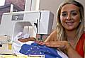 Hannah at work on her parachute-silk dress 