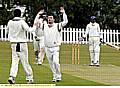 STRIKE ONE: Moorside bowler Lee Warburton revels in the wicket of Austerlands opener Abhi Ettimadai.