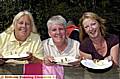 All smiles . . . childminders join in with the fun. They are (from the left): Linda Marsh, Val Ricketts and Margaret Lang. 