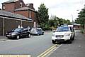 AT the scene . . . police search for clues in Hamilton Street. 
