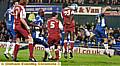Goalmouth chaos as Latics pile on the pressure 