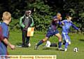 Diggle's Martin Mayall (right) shields the possession from Moldgreen's Chris Thomson.
