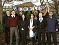 CUTTING out waste . . . Mark Husdan (front left), Oldham Council’s waste minimisation and efficiency manager, and Sarah Furbey (front, second left), Freecycle group moderator, are pictured with supporters and Freecycle users 

