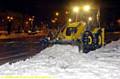 A JCB clears snow before dawn on the council’s Waterloo Street car park 