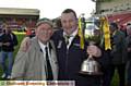 TONY O’Donnell (left) with Oldham St Anne’s coach Chris Deakin after the club’s success against West Hull in the 2003 National Cup final at Bloomfield Road, Blackpool. 

