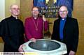 WARM welcome . . . the Rev John Rosedale, right, is inducted into St Thomas’s Church by the Bishop of Middleton, the Rt Rev Mark Davies, centre, and Saddleworth Team Rector Christopher Halliday, left 