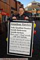 PLUMBER Jonathan Fletcher advertising his skills in Market Place. 