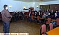 VISION OF THE FUTURE: Coach Tony Benson addresses a meeting of Roughyeds fans at the club’s proposed new headquarters at the Whitebank Stadium in Limeside. 