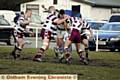 HELD: Saddleworth’s Jason Best takes some stopping in his side’s 34-6 win over Millom in National Conference League division one. 
