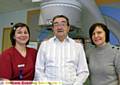 FIRST patient . . . Jack Horrocks is the first patient to be treated at Oldham’s Christie radiotherapy centre. Also pictured are radiographer Melissa Woodward (left) and consultant Jac Livsey 