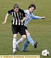 ANDY Cropper (right) of Oddies, beats Failsworth Athletic’s Drew Wilson to the ball. 