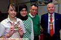 WINNER Haleama Kershaw (left) with (from left) runner-up Aisha Waheed, judge Tom Harrop and Peter Fryer, president of the Chadderton and Failsworth Rotary Club. 
