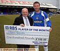 SHINING LIGHT . . . Sean Gregan receives his player of the month cheque for February from Mike Flaganan, manager of the Spindles Centre, sponsors of the award. 