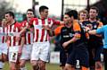 GET BACK: Exeter City’s Richard Duffy (third, left) and Athletic midfielder Dean Furman have a difference of opinion. 