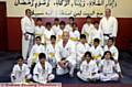 YOUNGSTERS from the Glodwick Estate Shukokai Karate club with their teachers 
