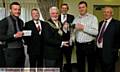 Mayor of Oldham, Councillor Jim McArdle (third from left) presents Oldham St Anne’s coach Mick Cashin with the Rugby Oldham Challenge trophy. Also pictured are St Anne’s captain Danny Kay (left), winner of the £500 cheque as Man of Steel, Iain Taylor (Rugby Oldham chairman), Geoff Cooke (Rugby Oldham membership secretary) and Spen Allison (BARLA chairman). 
