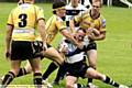 CAUGHT... Saddleworth Rangers forward Adam Walker (on ground) is tackled by Skirlaugh duo Matty Danville (left) and Sean Wildbore (right). 
