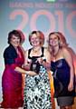 CONGRATULATIONS . . . Park Cake managing director Anne Allen (centre) receives the award from TV presenter Esther Rantzen (left) and Melanie Somerville, marketing manager of award sponsor ADM Milling 