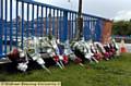SORROW . . . floral tributes have been laid at the scene 