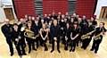 BIG band: Pride nominees Failsworth Community Band, with Matthew Garlick (centre) 

