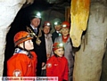 STALACTITES... Cameron Heap and Maddison Smith join, from left, Oldham Mayor Councillor Richard Knowles, Youth Mayor Chantel Birtwistle, centre manager Dave Falconridge and Mayoress Valerie Knowles in the caves. 