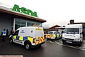 ON the scene . . . police arrive at Asda in Shaw 
