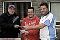 HANDOVER . . . Mel Bagley (left) presents the cheques to Lees and Hey Open winner Dean Hibbert (centre) and runner-up Matt Gillies. 