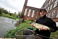 NET-BUSTER: Andrew Mitchell shows off a fish at Chadderton Mill Lodge. 