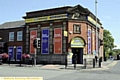 CONTROVERSY GENERATOR: THE blue and red window signs and large yellow sign over the door have been disallowed by the council, though the remaining yellow signs have been approved. 