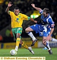 WHERE IT ALL STARTED: Dale Stephens pictured on his Athletic debut, challenging Norwich City’s Korey Smith. 
