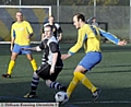 EYES ON THE BALL: Hollinwood’s Gary Nolan (left) tracks James Langin, of Leigh Athletic. 